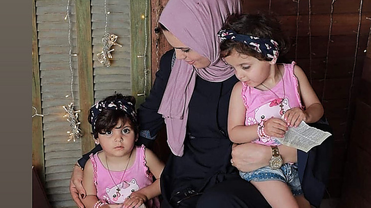 Photo of Alaa from Gaza, with her twin girls.